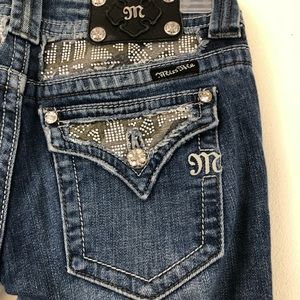 Miss Me camo accent skinny jeans